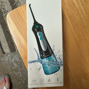 Brand new in M pro cordless irrigation Flosser water pick.